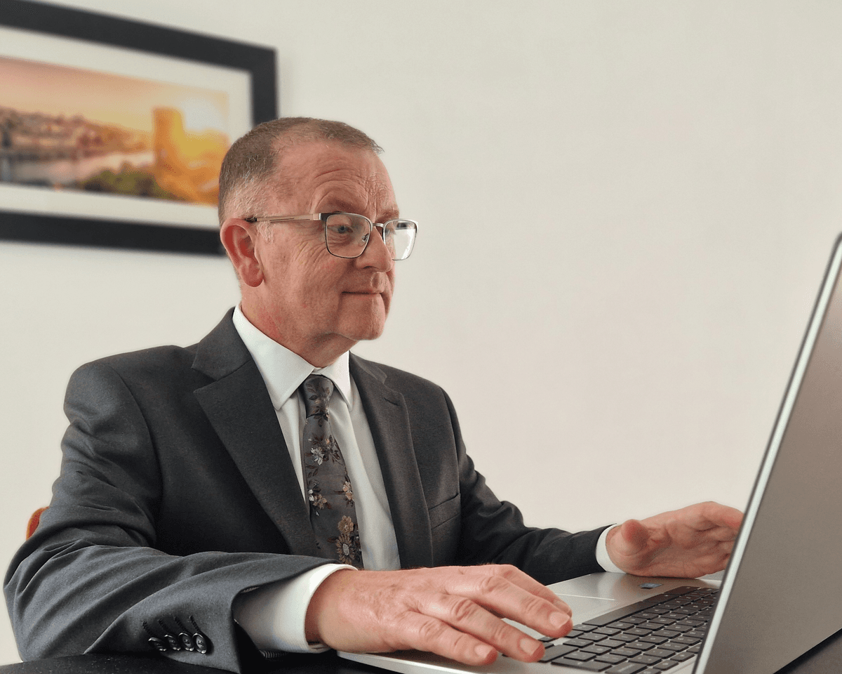 Two professionals in a meeting discussing business strategy.